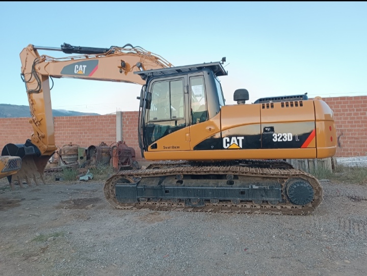Screenshot_20240521_214151_edit_6408355506843 Excavadora 323 DL - Imagen 1